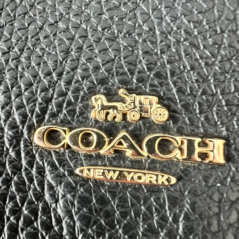 Coach Elle Backpack in black pebbles
Leather. Like new. Gold tone hardware. - Picture 2 of 16